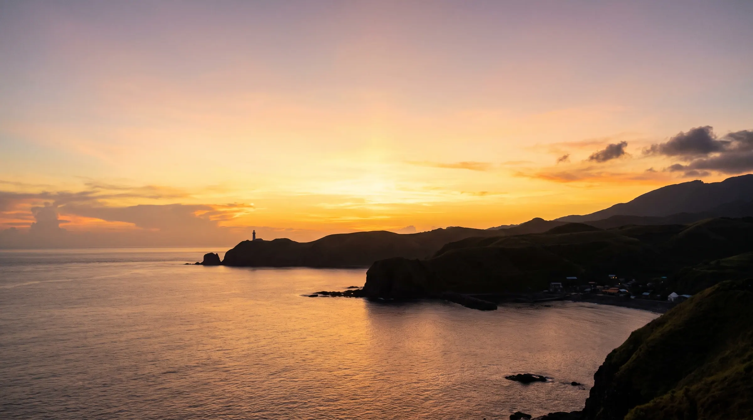 The Batanes coastline at sunset over the Luzon Strait